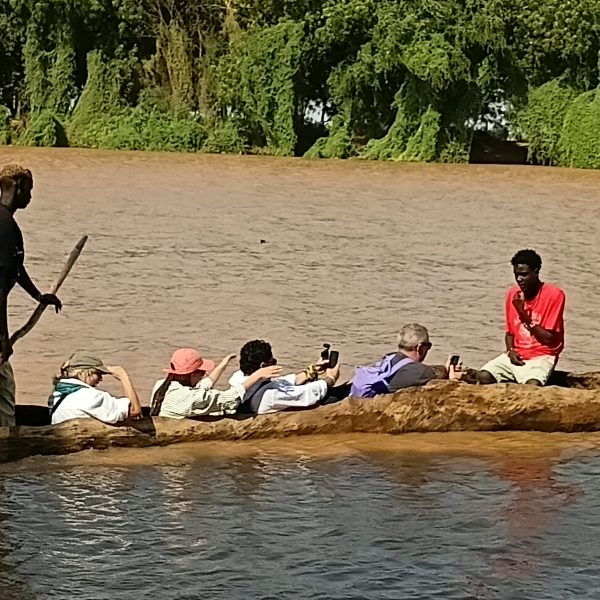 Amplitude Tour & Travel holiday package travelers enjoying guided tours international travel experience affordable vacation packages professional tour services