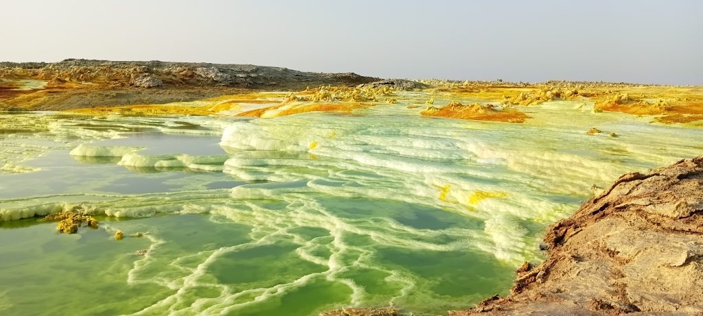 Lalibela Danakil Tour rock-hewn churches Ethiopia
Lalibela Danakil Tour Erta Ale volcano lava crater
Lalibela Danakil Tour Dallol colorful geothermal landscape
